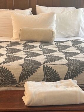 Neutral Beige and Gray Quilted Bedspread with Feather Motif